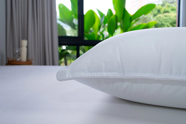 Almohada sensación pluma firmeza alta