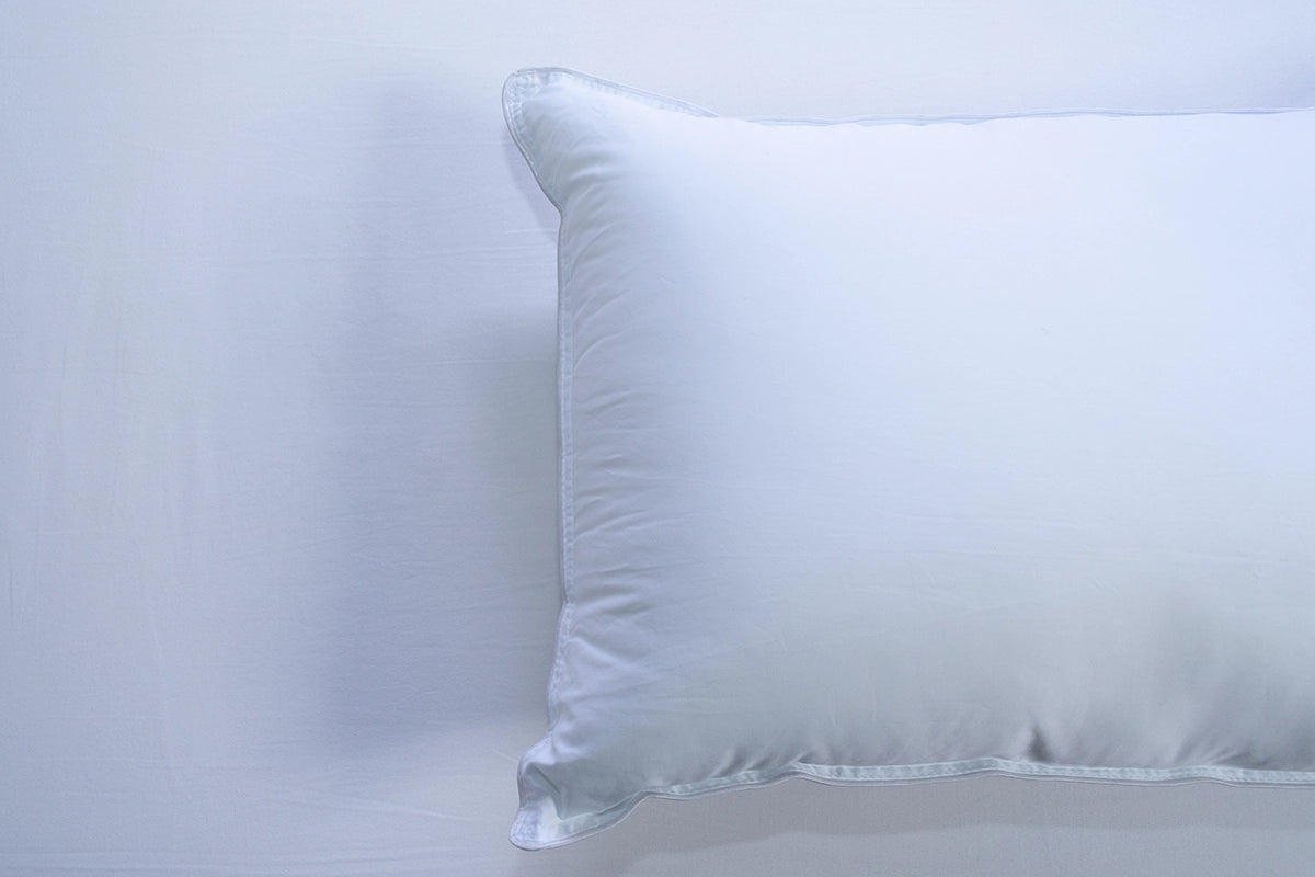 Almohada sensación pluma firmeza alta