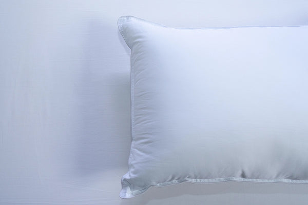 Almohada sensación pluma firmeza alta