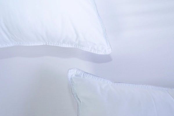 Almohada sensación pluma firmeza alta