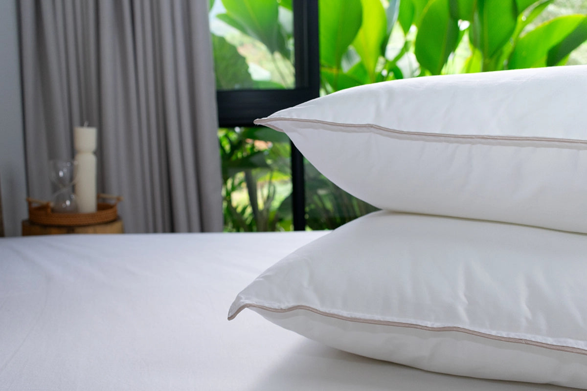Almohada  sensación pluma firmeza baja