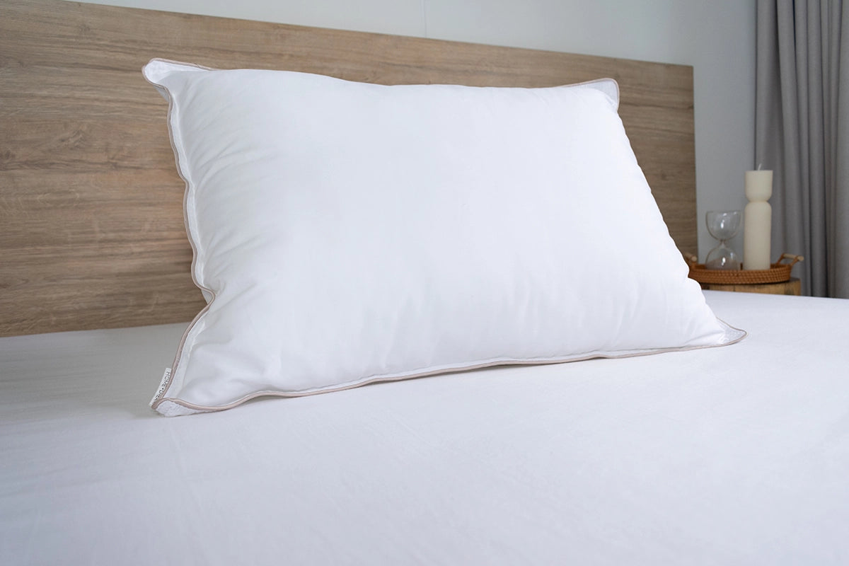 Almohada  sensación pluma firmeza baja