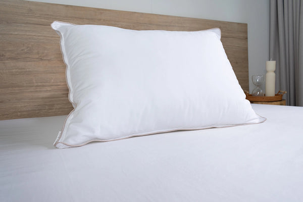 Almohada  sensación pluma firmeza baja