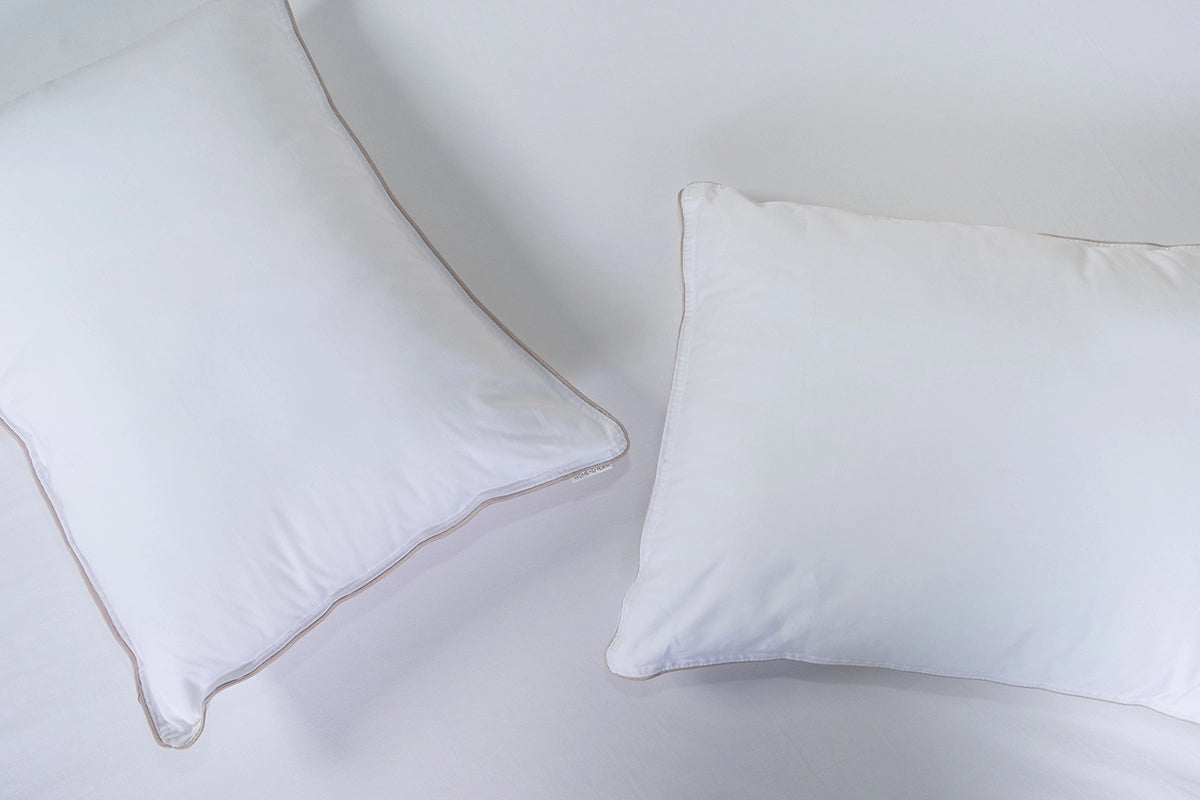 Almohada  sensación pluma firmeza baja