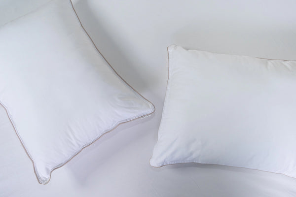 Almohada  sensación pluma firmeza baja