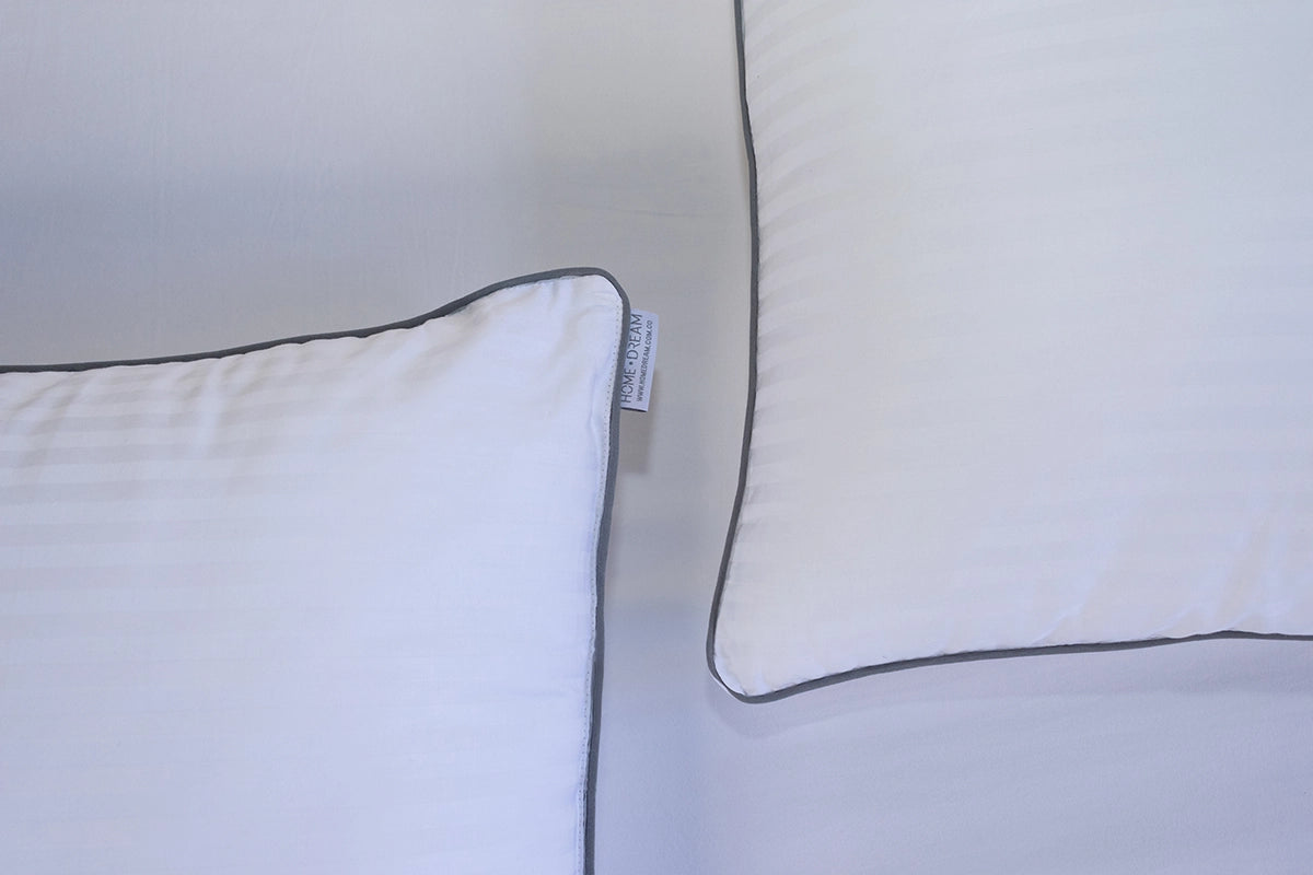 Almohada sensación pluma firmeza media