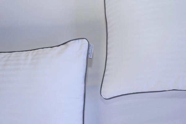Almohada sensación pluma firmeza media