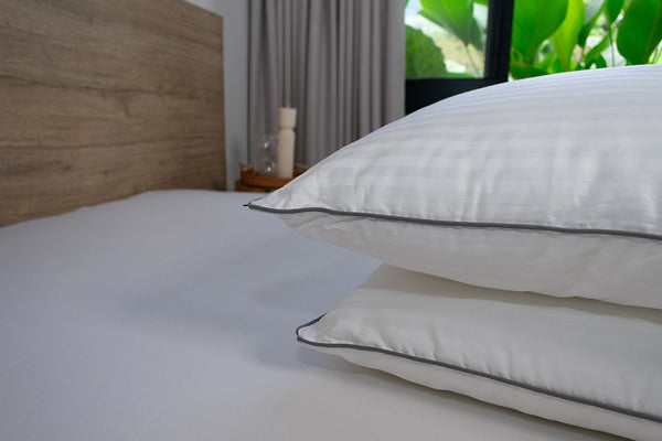 Almohada sensación pluma firmeza media